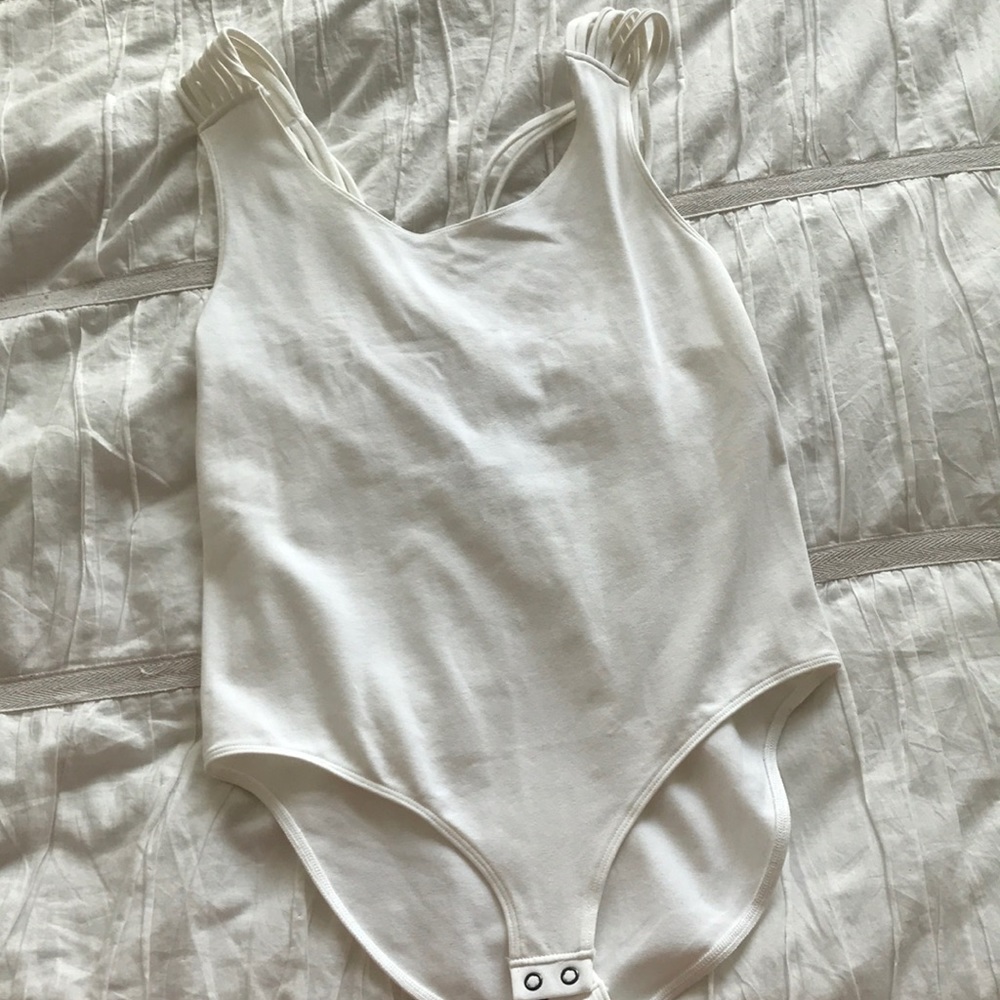 Strappy white one piece body suit